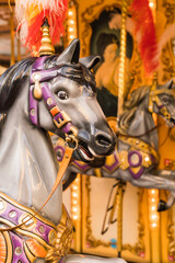 Close up - detail of an outdoor carousel in a square in Florence, Italy