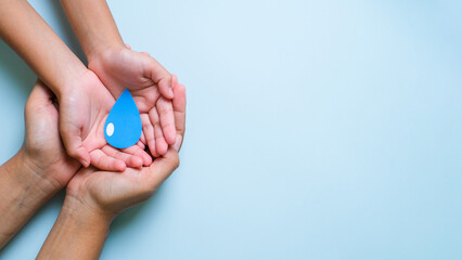 Hands holding earth globe, world environment day, world earth day, world ocean day.