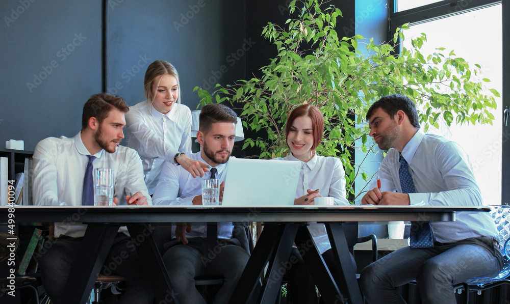 Wall mural business colleagues discussing new opportunities. people and technology.