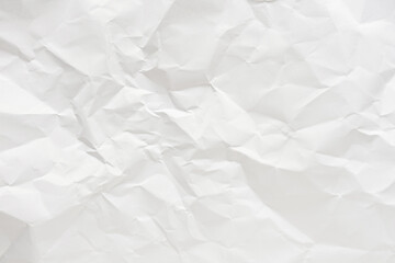 White crumpled paper texture background.