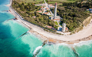 Aerial drone panorama shot of the Phare des Baleines or Lighthouse of the Whales taken from the sea on Ile de Ré or island of Re France - obrazy, fototapety, plakaty