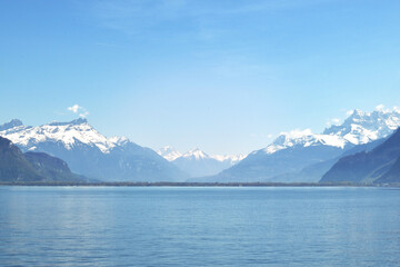 Geneva lake is famous place in Switzerland. Alp mountains with glacier. Beautiful outdoor landscape.