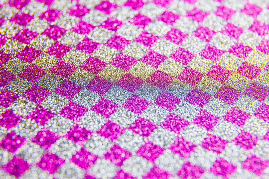 square texture, Abstract colourful purple creative macro bokeh background. Multi colored glitter becoming defocused, shining bokeh, selective focus