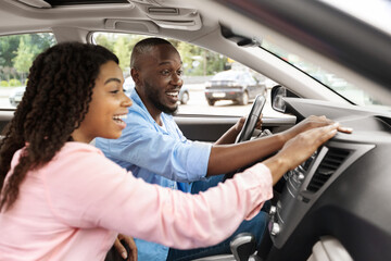 Happy African American Couple Touching New Auto
