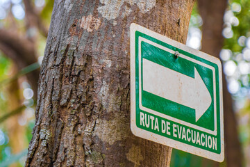Santuario de los guerreros information evacuation route sing board Mexico.