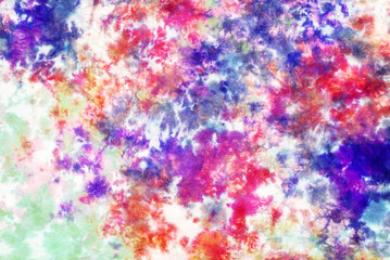 tie dye pattern hand dyed on cotton fabric background.