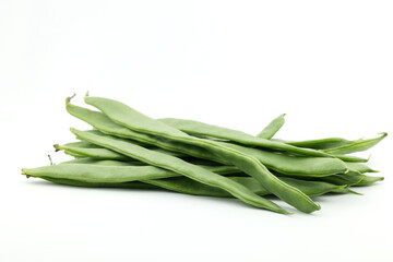 Pile of common beans, french bean (Phaseolus vulgaris) isolated on white background, flat pods green beans bunch