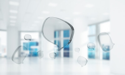 Concept of communication by glass empty chat icon on office background. Mixed media