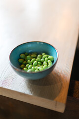 raw edamame in bowl, japanese cuisine