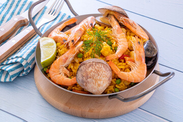 top view of a paella in a dish on a table