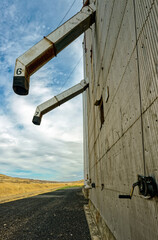 The loading spouts on bins at a grain elevator on the Palouse in
