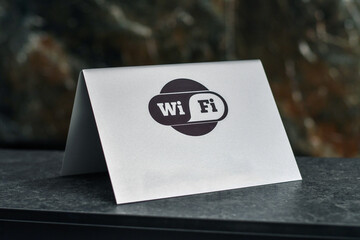 Metal plate with wi-fi sign in the modern office. Selective office. - obrazy, fototapety, plakaty