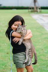 A Girl Asian Child  Lovey Kitty Hug Kitty  Outdoor  