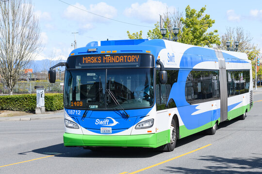 Everett, WA, USA - April 17, 2022; New Flyer Industries Articulated Bus In Swift Livery Of Community Transit In Everett Washington