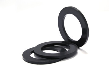 Pile of rubber gaskets and washers isolated on white