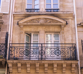 Parisian windows and balconies on a sunny day