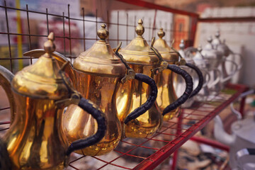 Fototapeta na wymiar Brass coffee pots displayed at local market at Jordan