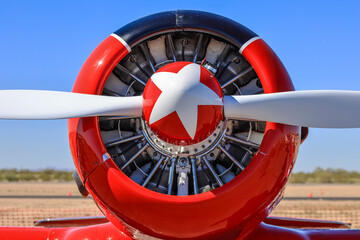 Close up photo of propeller and radial engine of a small airplane