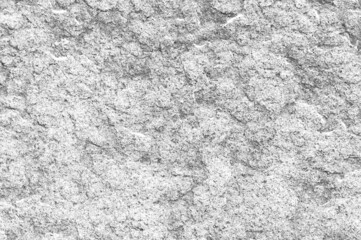 Grey stone wall texture.wall light grey granite stone natural pattern design or abstract background.
