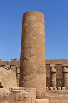Ancient architecture. The remaining column of the Kiosk of Taharqa at the Karnak Temple Complex in Luxor, Egypt. The largest temple complex of antiquity in the world. UNESCO World Heritage.