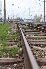 Fototapeta premium Railway tracks. Old railway, fresh green grass