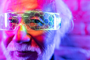 senior asian man with future vr glasses - metaverse concept -