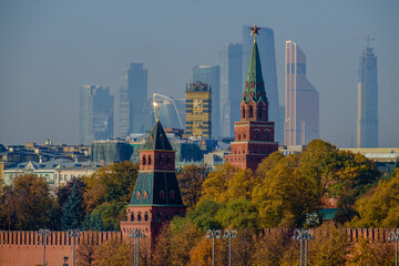 Russia, Moscow, the towers of the Moscow Kremlin against the backdrop of Moscow City skyscrapers.