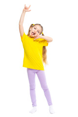 A happy and cheerful child dressed in a yellow T-shirt and purple pants plays, jumps.