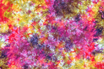 Fototapeta na wymiar tie dye pattern hand dyed on cotton fabric background.