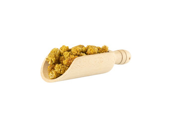 dried white mulberry fruit - latin Morus alba - in wooden scoop isolated on white background. Spices and food ingredients.