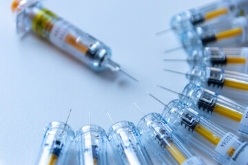 New medical vaccines ready for injection with syringe and vaccine to inject the cure for...