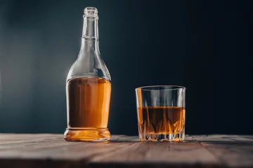 Gardinen bottle and glass of alcohol © Daniel