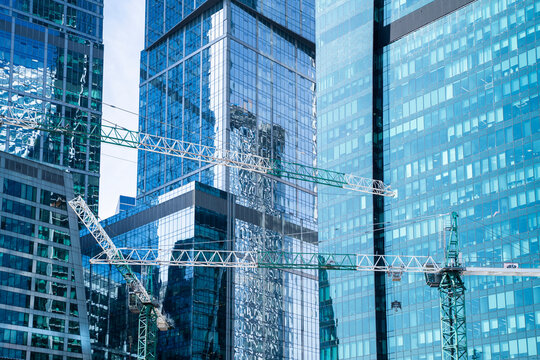 Moscow, Russia - April 18, 2018: Construction Cranes Against The Background Of The International Business Center . High Quality Photo