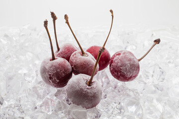 Fresh cherry berries on quick freeze ice