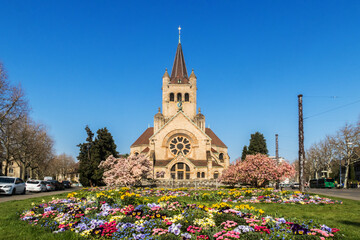 St. Paul's Church with colorful meadow and spring flower in Basel, Switzerland