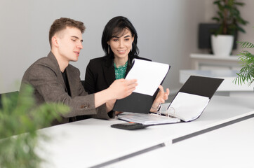 Businessman and businesswoman meeting In modern office