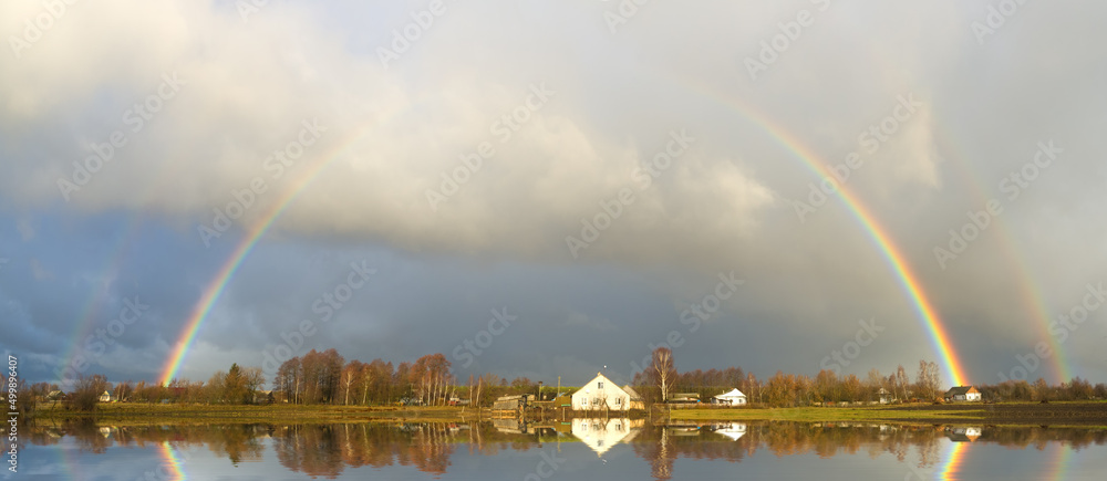 Sticker rainbow over the village