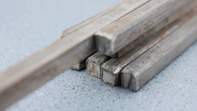 Metal fittings close-up. Metal rods. Metal iron bars.