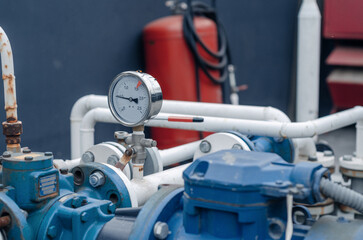 Manometer in production. Pressure equipment, chemical or pharmaceutical factory or factory with...