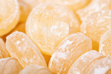 Background yellow sweet lollipops candy close-up macro photography