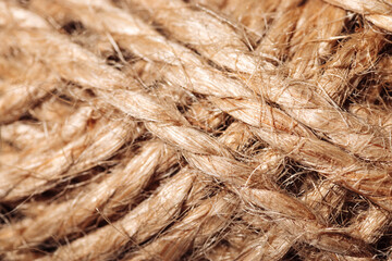 Texture brown skein of jute rope close-up macro photography