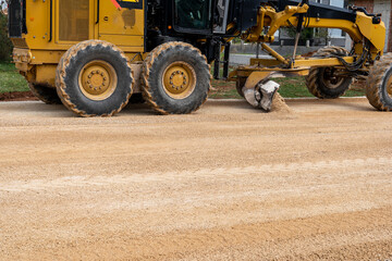 Grader Road Construction Grader industrial machinery. in excavation, earthworks and construction of new roads.   