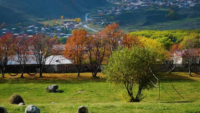 Mountain kazbek, Mkinvartsveri and town Stepantsminda, autumn colors of Georgia