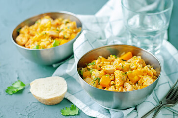 Pumpkin chicken parsley rice in a bowl