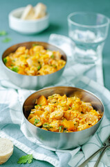 Pumpkin chicken parsley rice in a bowl