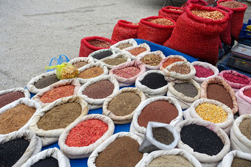 Unpackaged vegetable seeds, organic vegetable seeds, a large amount and variety of vegetable seeds, sold in cloth bags at the seed shop,