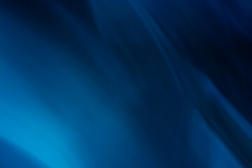 Blue abstract background. Back with oblique frill lines.
