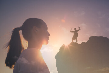 Silhouette of a person climbing to the top of a mountain. . Strong man, and woman, Winning, success...