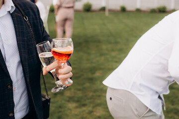 people with glasses of alcohol at a banquet