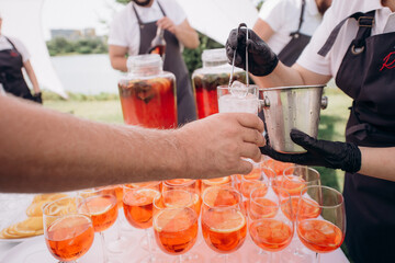people with glasses of alcohol at a banquet